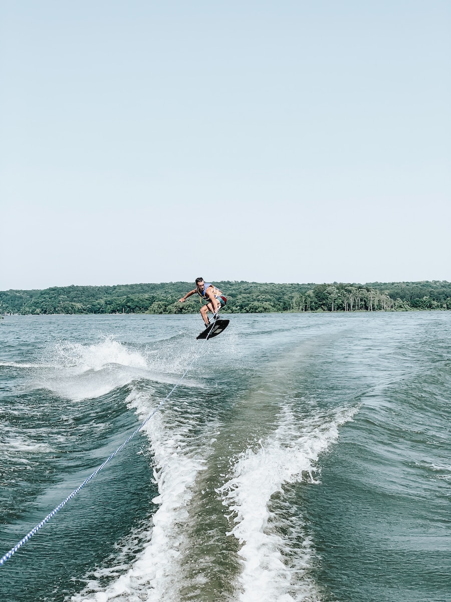 man riding on wake board